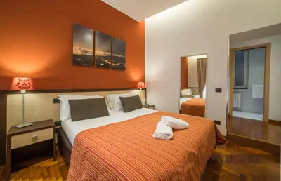 Letto o letti in una camera di B&B Chiaia 32