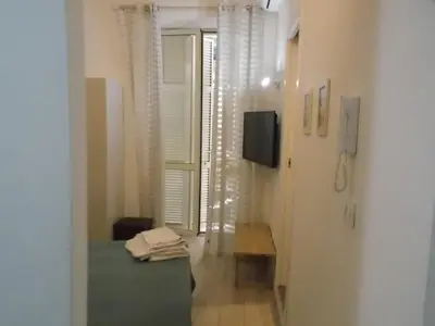 Letto o letti in una camera di B&B Ninarella Napoli