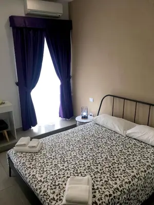 Letto o letti in una camera di Panoramic Terrazza SRL