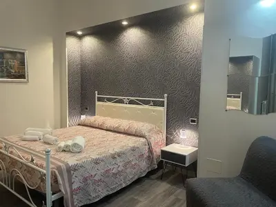 Letto o letti in una camera di B&B Plebiscito central suite