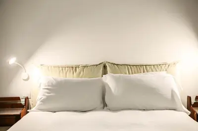 Letto o letti in una camera di Il Loggiato by Wonderful Italy
