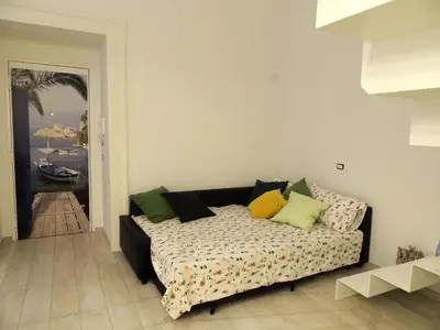 Letto o letti in una camera di Mare Napoli