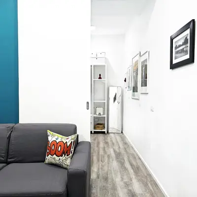 Area soggiorno di Napulitano Assaje Home, arte e tradizione nel cuore del Centro Storico!