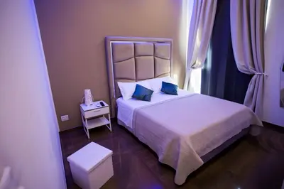 Letto o letti in una camera di Palazzo 15 Napoli