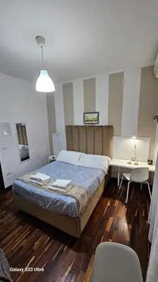 Letto o letti in una camera di B&B Napoli Centrale Room&Jacuzzi