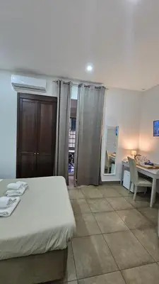 Letto o letti in una camera di B&B Napoli Centrale Room&Jacuzzi
