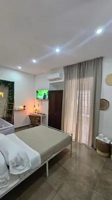 Letto o letti in una camera di B&B Napoli Centrale Room&Jacuzzi