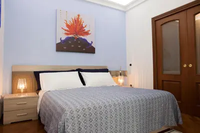 Letto o letti in una camera di Isa Guest Rooms