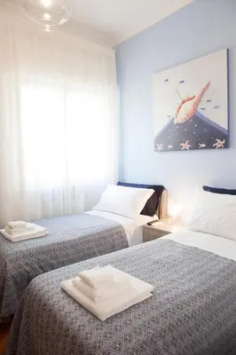 Letto o letti in una camera di Isa Guest Rooms