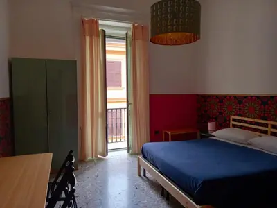 Letto o letti in una camera di CaraFe'&CaraSpe'