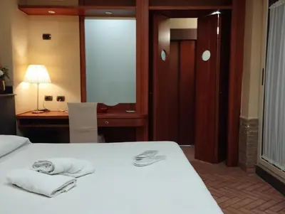Letto o letti in una camera di Hotel Suite Ares