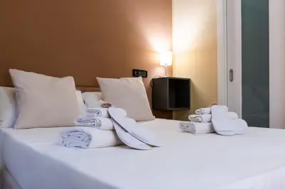 Letto o letti in una camera di Hotel Suite Ares