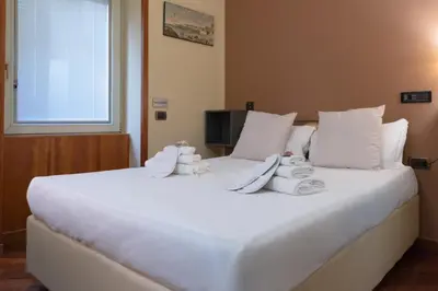 Letto o letti in una camera di Hotel Suite Ares