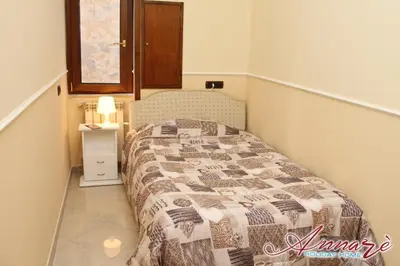 Letto o letti in una camera di Annarè Home Holiday