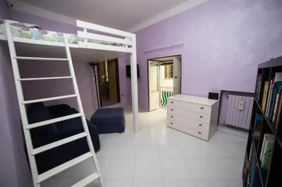 Letto o letti in una camera di Soggiorno Aria
