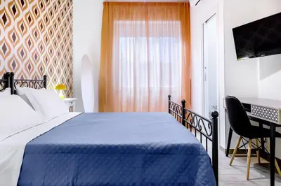 Letto o letti in una camera di 1970 Rooms