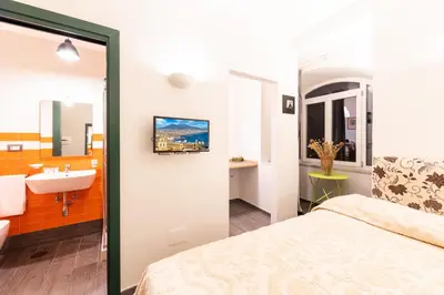 Letto o letti in una camera di Bien-Bì