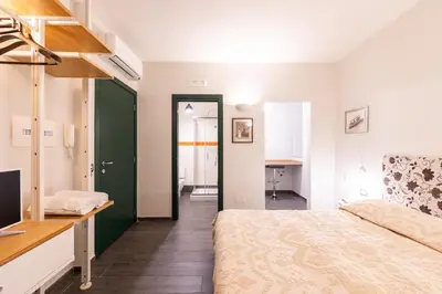 Letto o letti in una camera di Bien-Bì