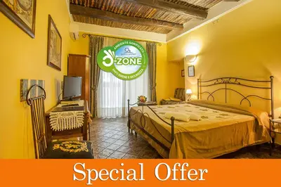 Letto o letti in una camera di B&B L'Alloggio Dei Vassalli