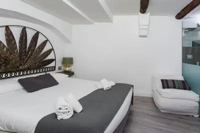 Letto o letti in una camera di WELLNESS HM wellness home By Dimorra