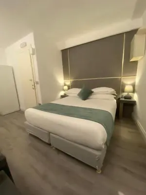 Letto o letti in una camera di WELLNESS HM wellness home By Dimorra