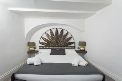 Letto o letti in una camera di WELLNESS HM wellness home By Dimorra