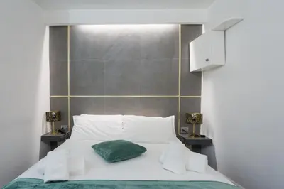 Letto o letti in una camera di WELLNESS HM wellness home By Dimorra