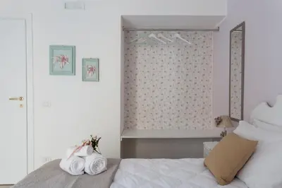 Letto o letti in una camera di La Maison Romantique