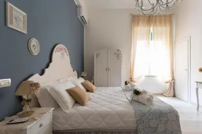 Letto o letti in una camera di La Maison Romantique