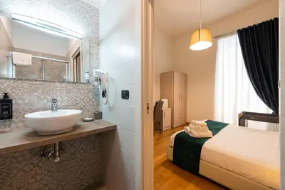 Letto o letti in una camera di Duomo Hermes Relais
