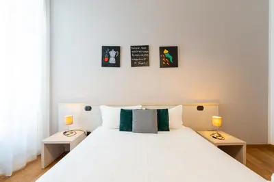 Letto o letti in una camera di Duomo Hermes Relais