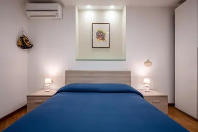 Letto o letti in una camera di Napoli Charming Apartments Vomero 