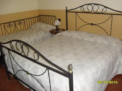 Letto o letti in una camera di Hotel PIGNATELLI Napoli