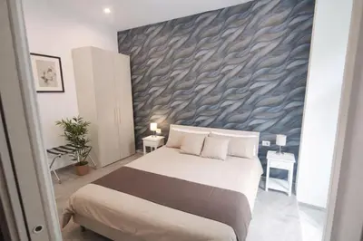 Letto o letti in una camera di B&B Da Ary colorful rooms