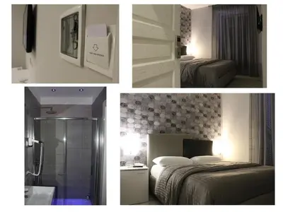 Letto o letti in una camera di B&B Fiumara