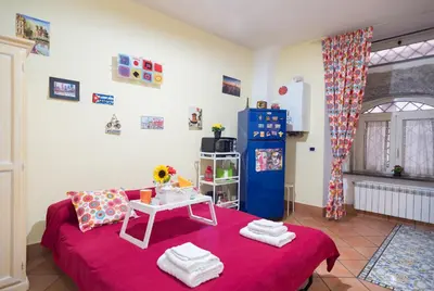 Letto o letti in una camera di Bobbò house