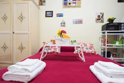 Letto o letti in una camera di Bobbò house