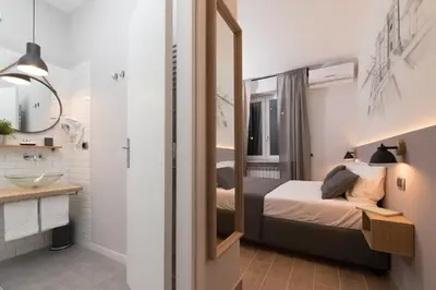 Letto o letti in una camera di Eco di Napoli