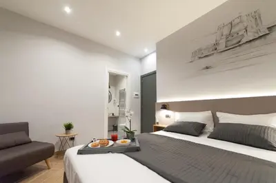 Letto o letti in una camera di Eco di Napoli