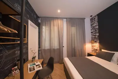 Letto o letti in una camera di Eco di Napoli