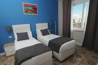 Letto o letti in una camera di La Casa di Giorgio Panoramic Rooms