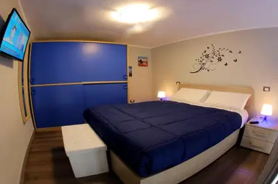 Letto o letti in una camera di L'oro di Napoli