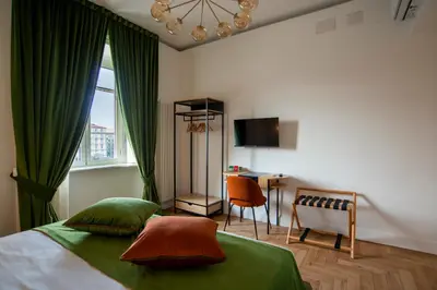 Letto o letti in una camera di The Five Rooms Napoli