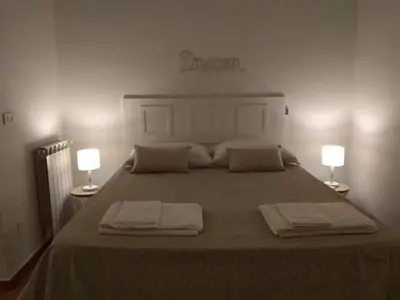 Letto o letti in una camera di Anna Home in Chiaia Unica sede