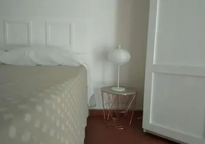Letto o letti in una camera di Anna Home in Chiaia Unica sede