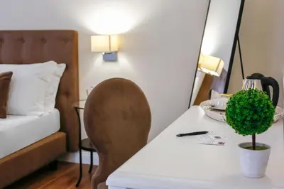 Letto o letti in una camera di La Fontanina Suites