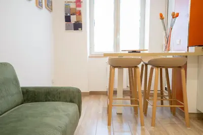 Area soggiorno di Vacuna Pleasant Rooms
