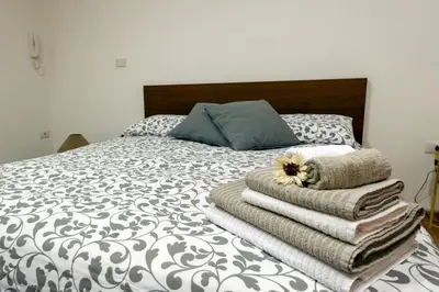 Letto o letti in una camera di Home Toledo 355