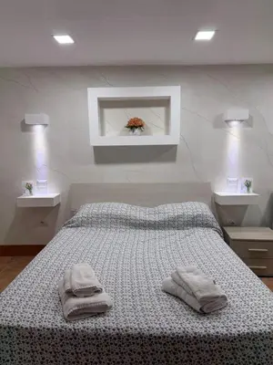 Letto o letti in una camera di Ciro E Lucia