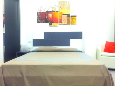 Letto o letti in una camera di Residenza Santa Lù B&B